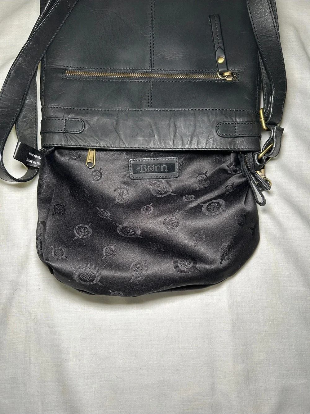 Born Black Leather Crossbody Bag with Gold Accents, Approximately 10.5x9.5